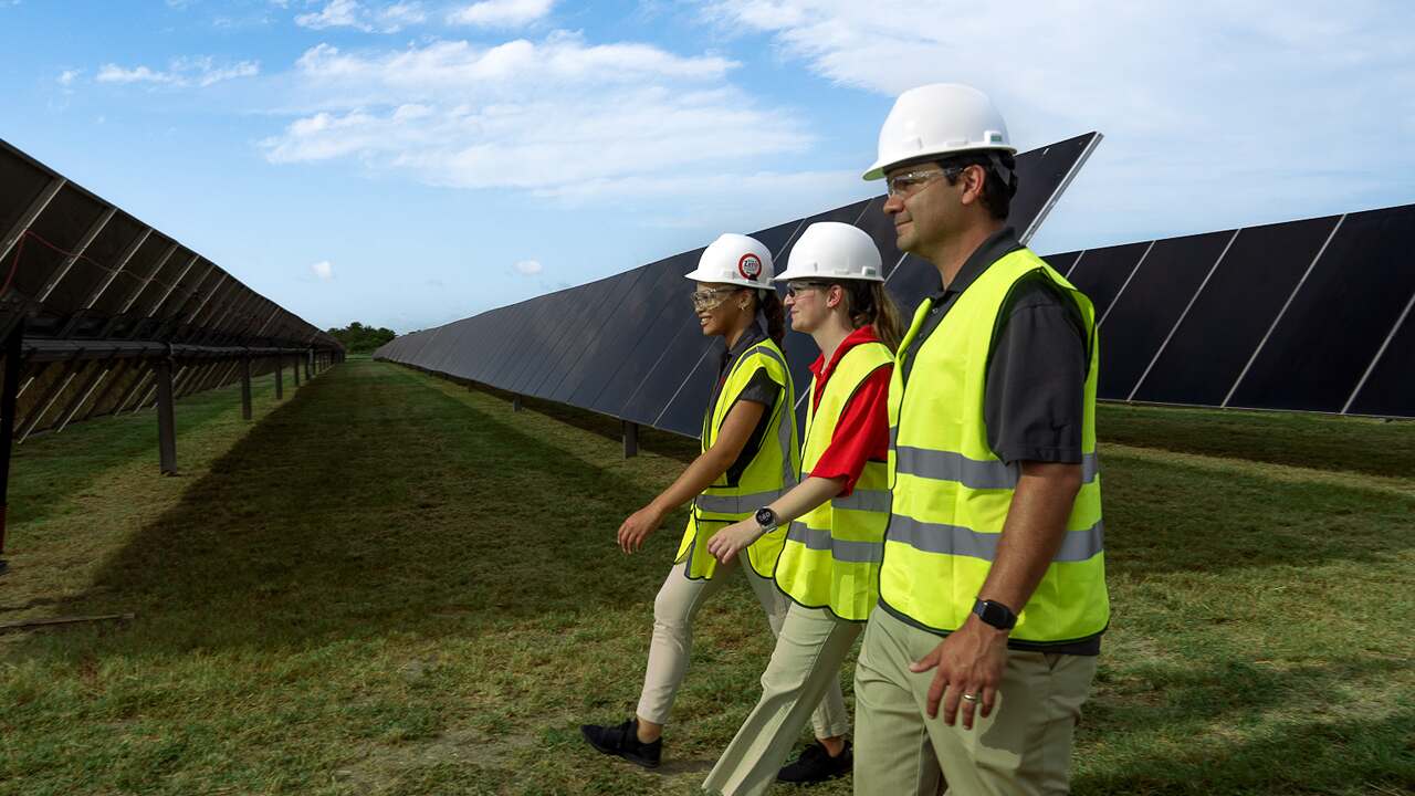 ti-employees-walking-on-solar-farm-in-texas-us.jpg